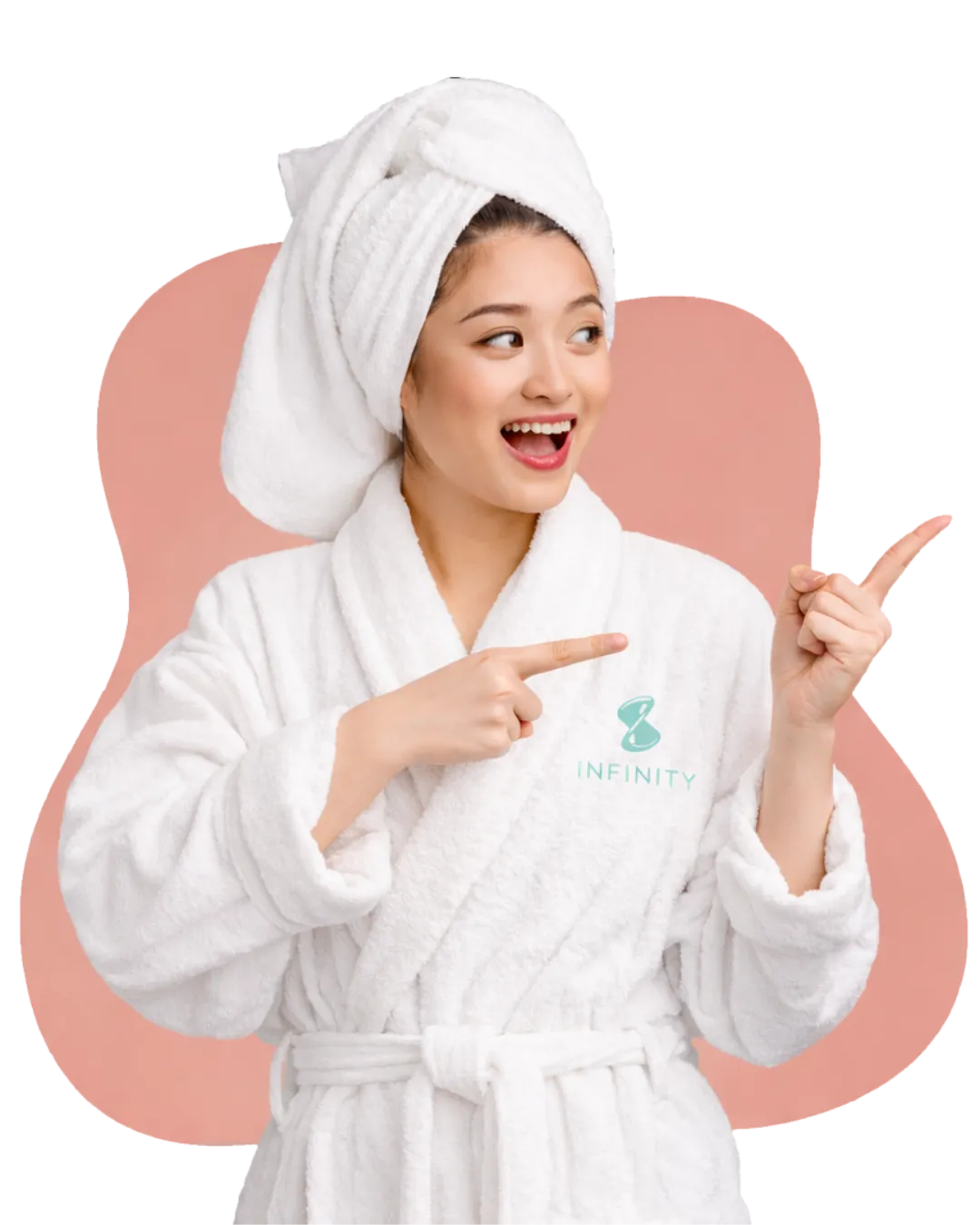 Woman in a white bathrobe with a towel on her head, smiling and pointing, featuring the Infinity Spa logo, representing wellness and relaxation services.